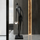 Noir Muse Sculpture Curated Mouth-Blown Frosted warm illuminated room view