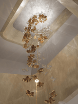 Tidal Stair Chandelier – Ambient Illumination in Luxury Interior Setting View 4