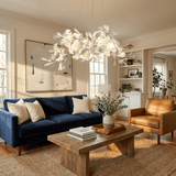 Gingko Curated Solid Brass Chandelier warm illuminated room view