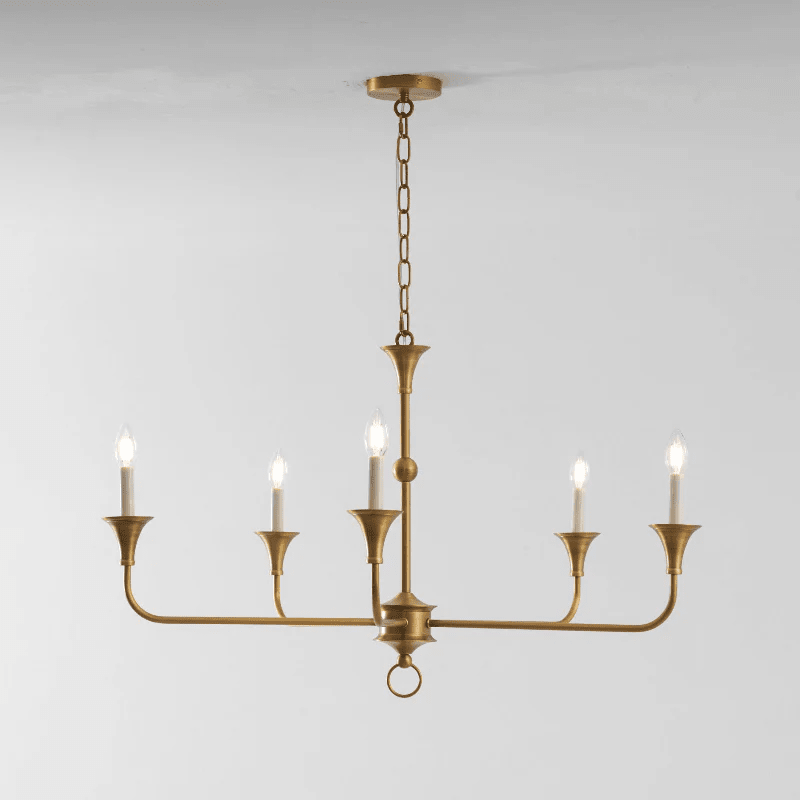 Elara Candle Curated Solid Brass Chandelier – illuminated warm ambiance setting #1