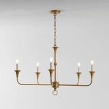 Elara Candle Curated Solid Brass Chandelier – illuminated warm ambiance setting #1
