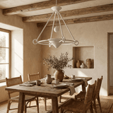 Sculptural Plaster Curated Iron & Glass Chandeli installed in residential dining space