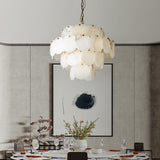 Shell Carved Alabaster Chandelier – illuminated warm ambiance setting