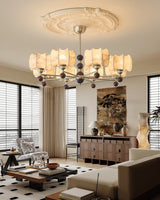 Arboris Floral Curated Finished Iron Chandelier – illuminated warm ambiance setting