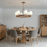 Arianna Leather Curated Solid Brass Chandelier installed in residential dining space