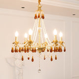 Petala Amber Art Glass Chandelier warm illuminated room view