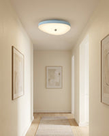 Avenlo Curated Optical Acrylic Flush Mount Ceili warm illuminated room view