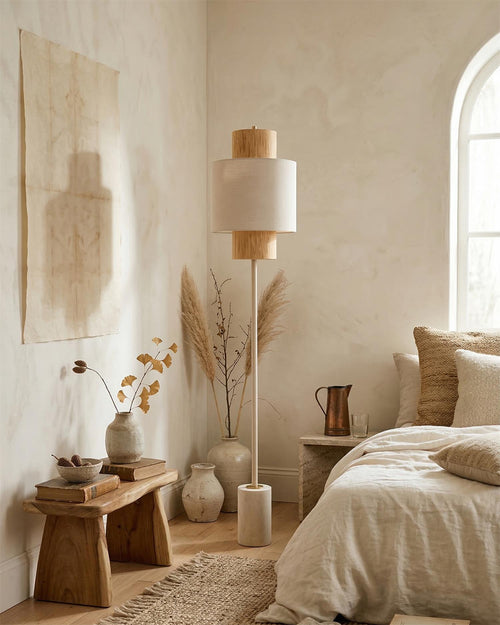 Avenor Curated Yellow Travertine Floor Lamp installed in residential dining space