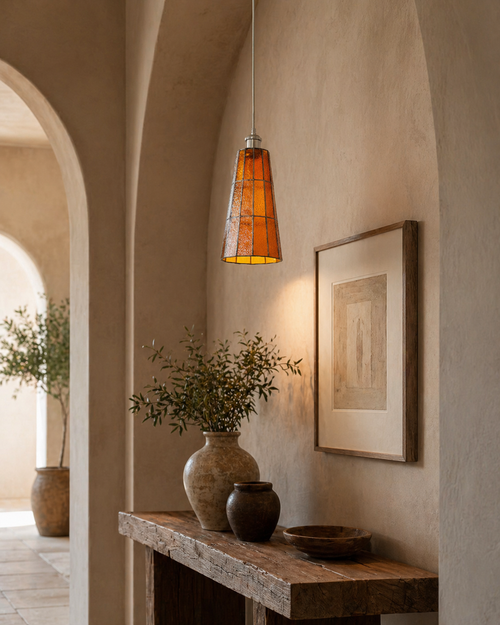 Azurielle Curated Amber Art Glass Pendant Light installed in residential dining space