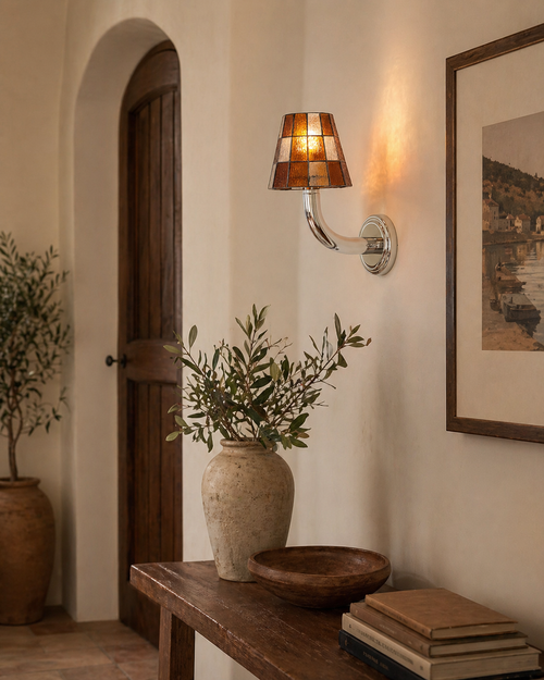 Azurielle Curated Amber Art Glass Wall Sconce installed in residential dining space