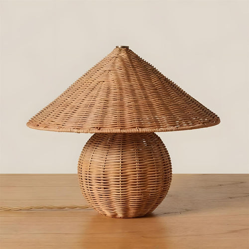Baskora Curated Woven Rattan Table Lamp installed in residential dining space