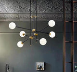 SI Curated Mouth-Blown Frosted Glass Chandelier – spatial dining room perspective