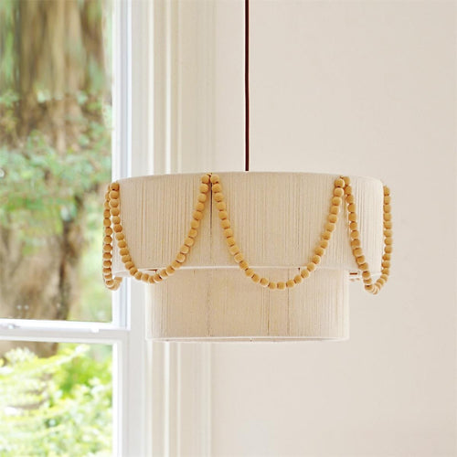 Beadelle Curated Iron & Glass Pendant Light installed in residential dining space