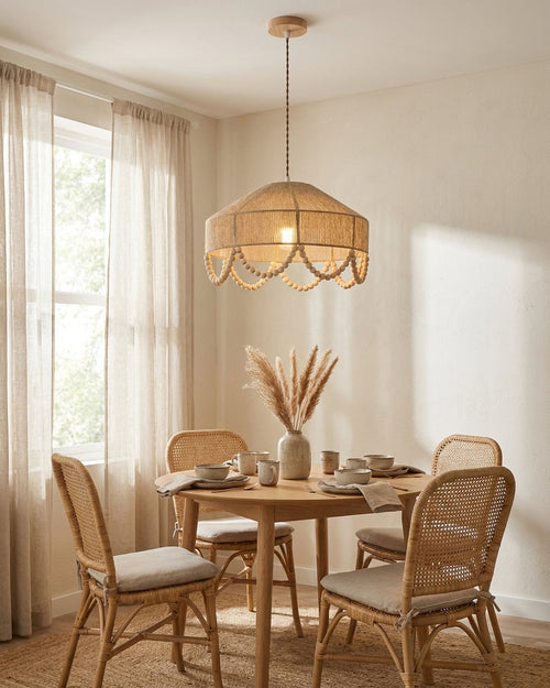 Beadora Curated Iron & Glass Pendant Light installed in residential dining space