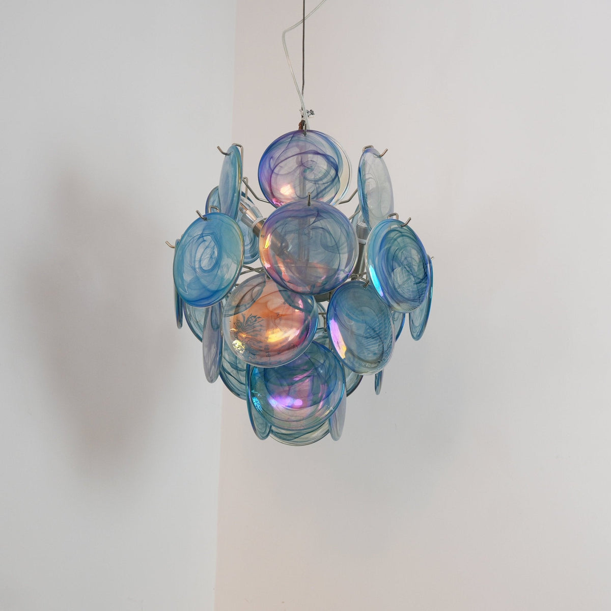 Blue Disc Glass Curated Mouth-Blown Frosted Glas – illuminated warm ambiance setting