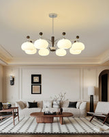 Bogart Curated Mouth-Blown Frosted Glass Chandel warm illuminated room view
