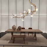 Brass Flower Branch Curated Solid Brass Chandeli installed in residential dining space