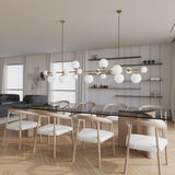 Brass Glass Globe Curated Mouth-Blown Frosted Gl installed in residential dining space