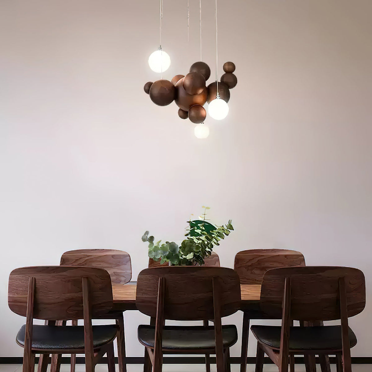 Bubble Wood Balls Curated Optical Acrylic Chande warm illuminated room view