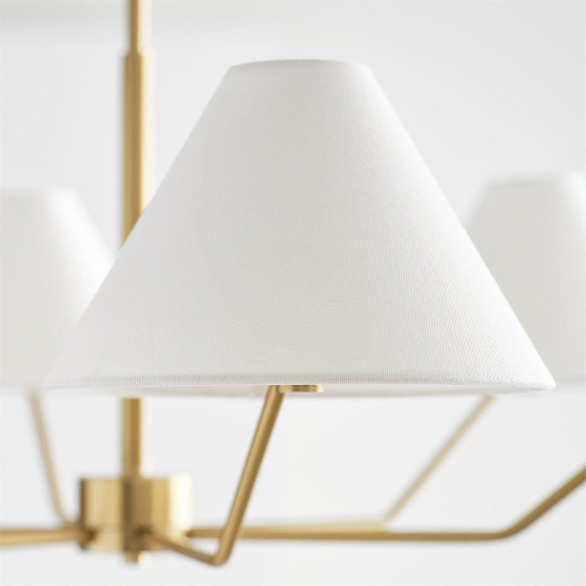 Burke Curated Iron & Glass Chandelier – illuminated warm ambiance setting