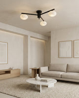 Caelvane Curated Alabaster Flush Mount Ceiling L warm illuminated room view