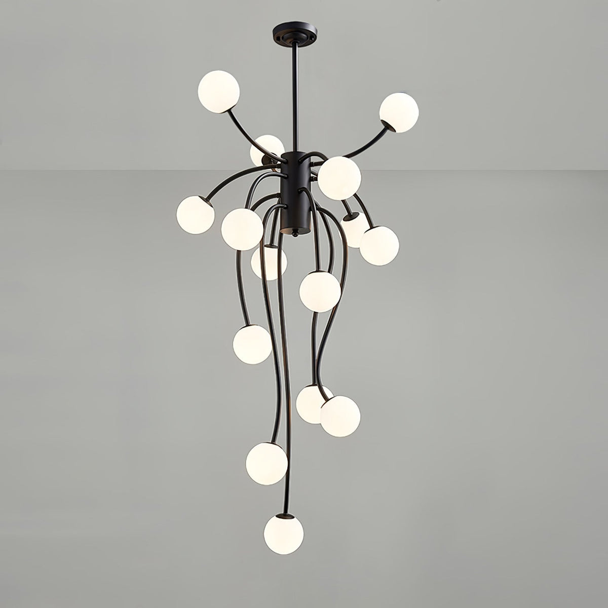 Caroline Curated Mouth-Blown Frosted Glass Chand – illuminated warm ambiance setting #1