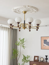 Ceylian Curated Mouth-Blown Frosted Glass Chande – illuminated warm ambiance setting