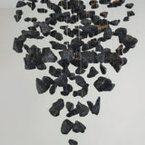Charcoal Chandeliers W Curated Iron & Glass Chan installed in residential dining space