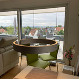 Circular Curated Iron & Glass Chandelier – illuminated warm ambiance setting