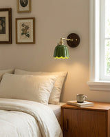Clarette Curated Solid Brass Wall Sconce installed in residential dining space