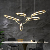 Cloud Rings Series Brass Curated Solid Brass Cha installed in residential dining space