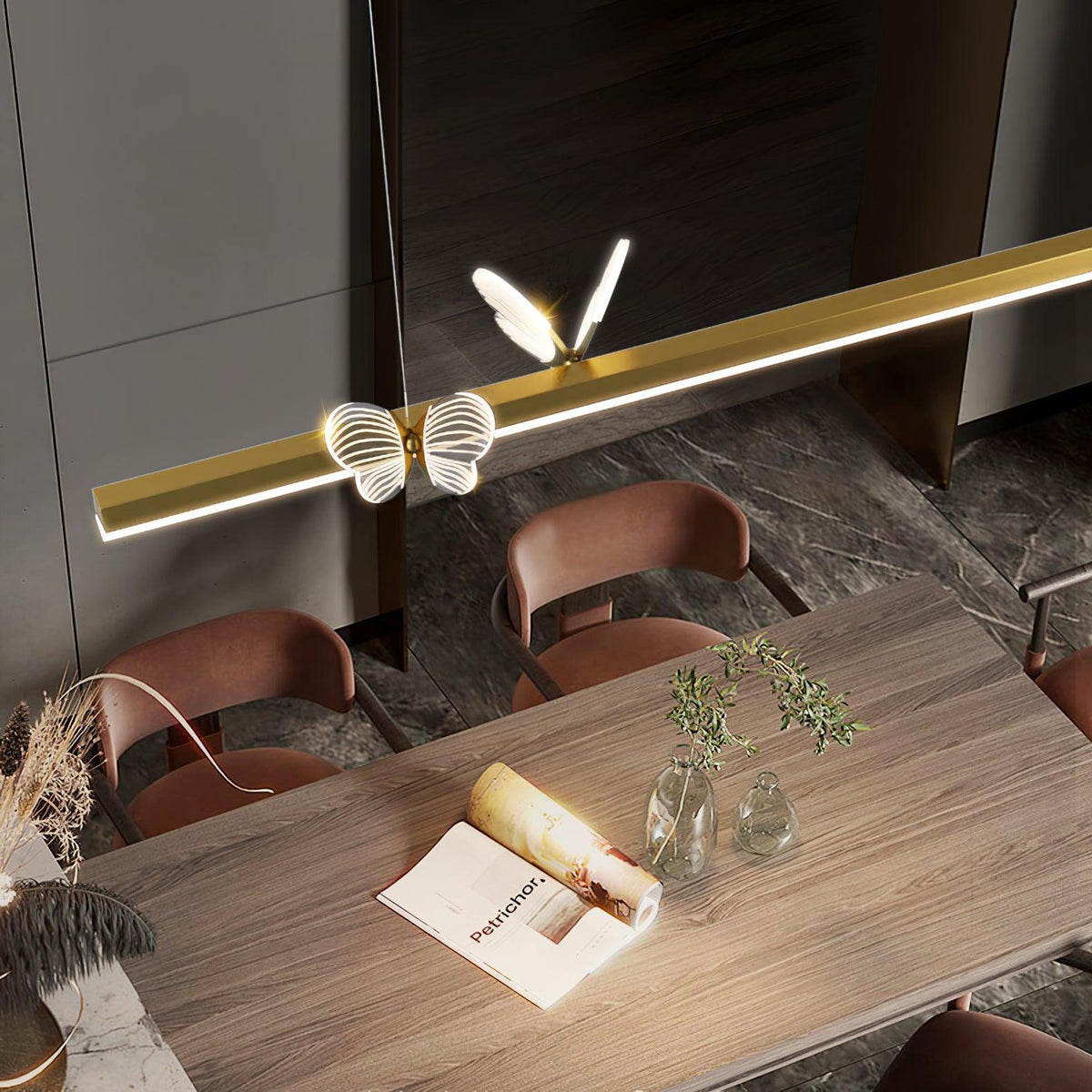 Cohen Butterfly Curated Optical Acrylic Chandeli – illuminated warm ambiance setting
