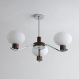 Colome Curated Mouth-Blown Frosted Glass Chandel – illuminated warm ambiance setting #1