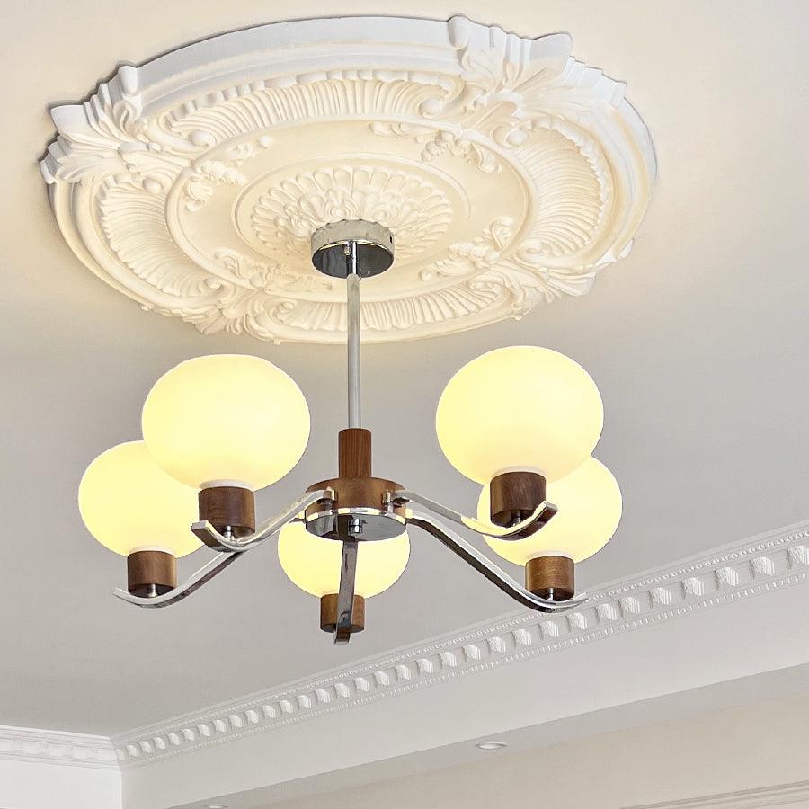 Colome Curated Mouth-Blown Frosted Glass Chandel installed in residential dining space