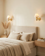 Contrast Alabaster Curated Alabaster Wall Sconce warm illuminated room view