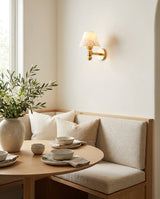Contrast Alabaster Curated Alabaster Wall Sconce – illuminated warm ambiance setting