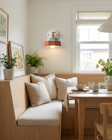 Cottara Curated Solid Brass Wall Sconce – spatial dining room perspective