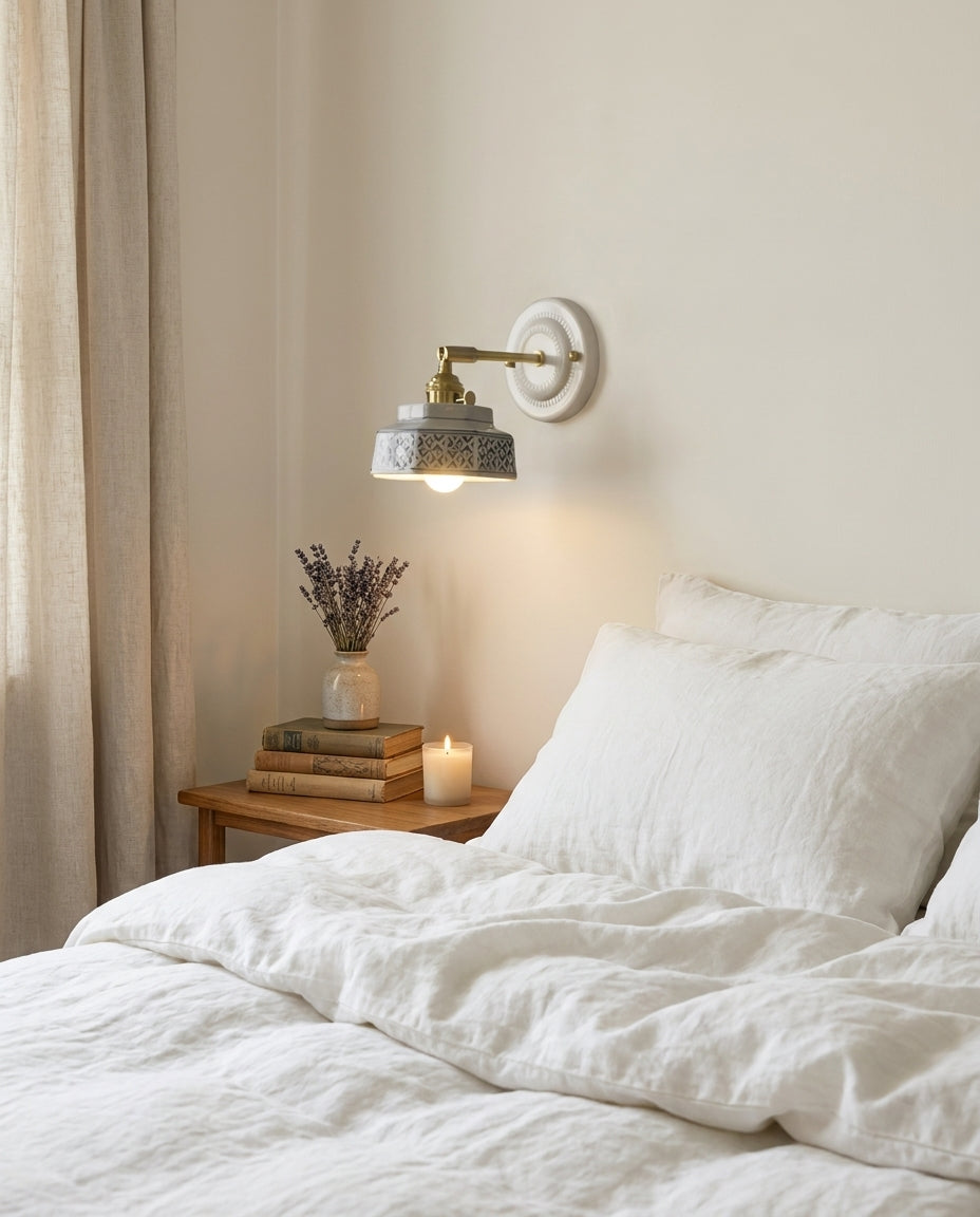 Cottara Curated Solid Brass Wall Sconce warm illuminated room view