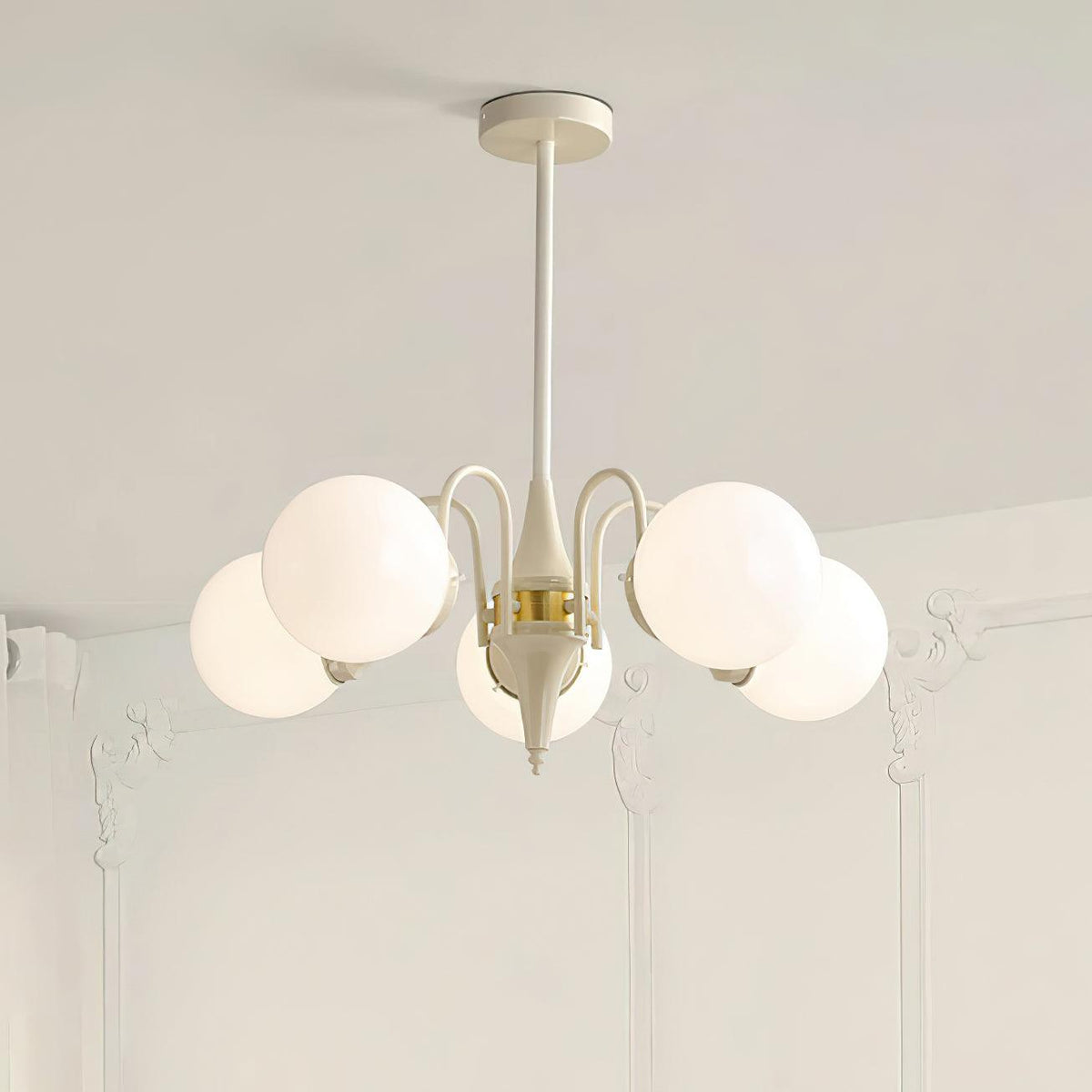 Cream Ball Curated Mouth-Blown Frosted Glass Cha warm illuminated room view