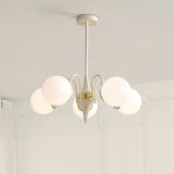 Cream Ball Curated Mouth-Blown Frosted Glass Cha warm illuminated room view