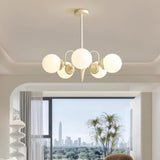 Cream Glass Ball Curated Mouth-Blown Frosted Gla warm illuminated room view