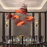 Crimson Swirl Koi Curated Iron & Glass Chandelie – unlit natural material contrast