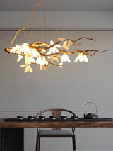Crushed Natural Stone Curated Solid Brass Chande warm illuminated room view