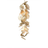 Cattail Leaf Curated Iron & Glass Chandelier – illuminated warm ambiance setting #1