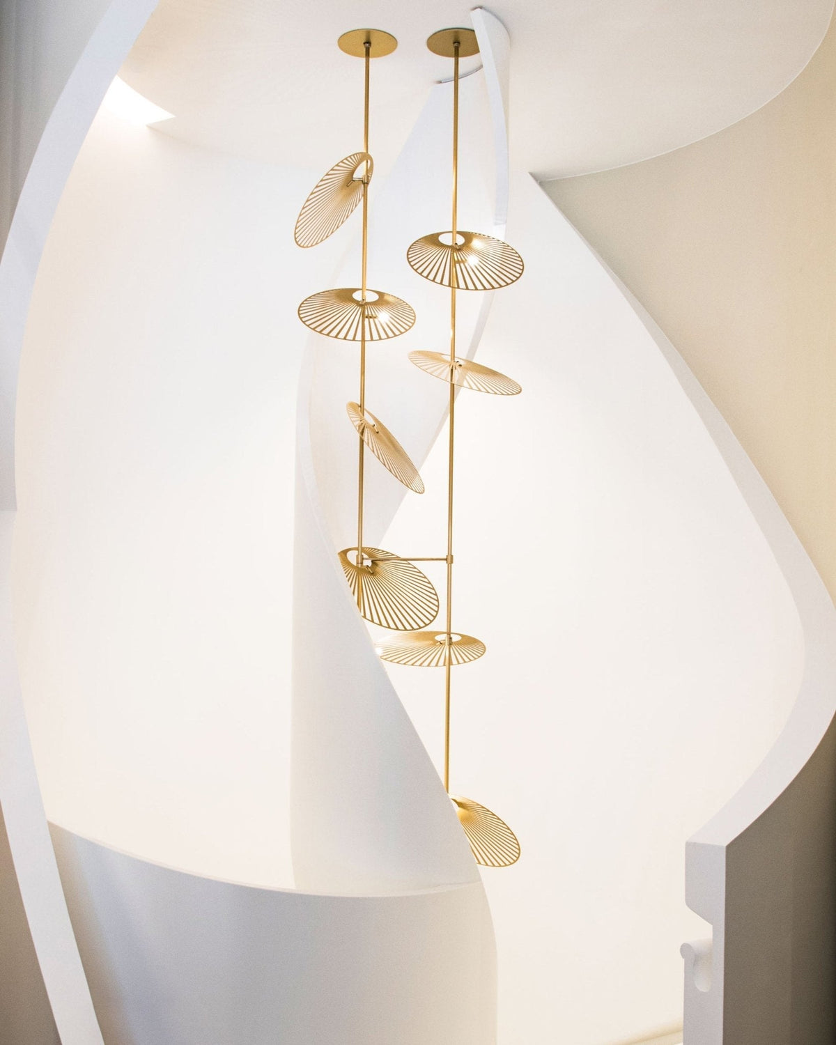 Cattail Leaf Curated Iron & Glass Chandelier installed in residential dining space