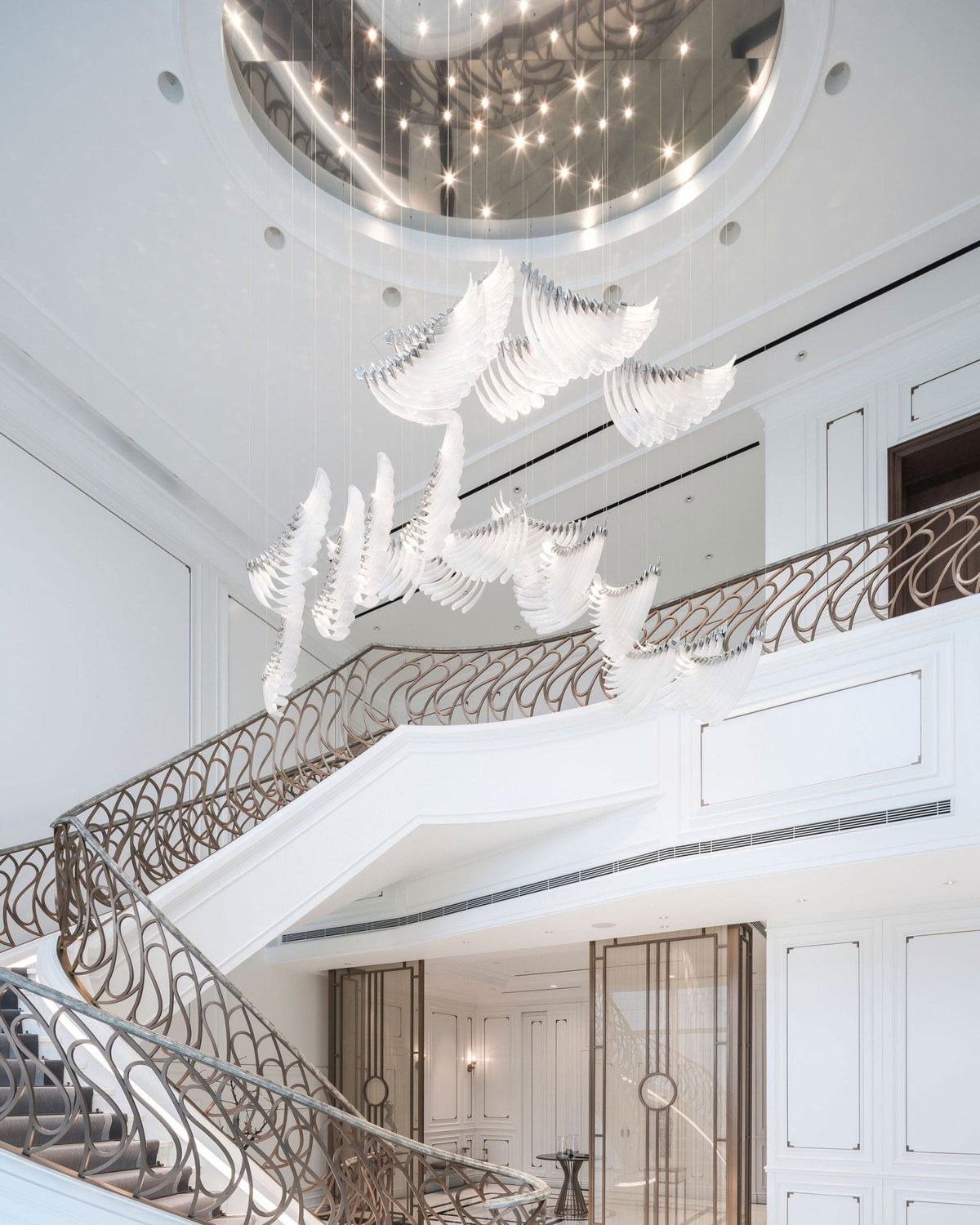 Pluma Sculptural Feather Chandelier – unlit natural material contrast