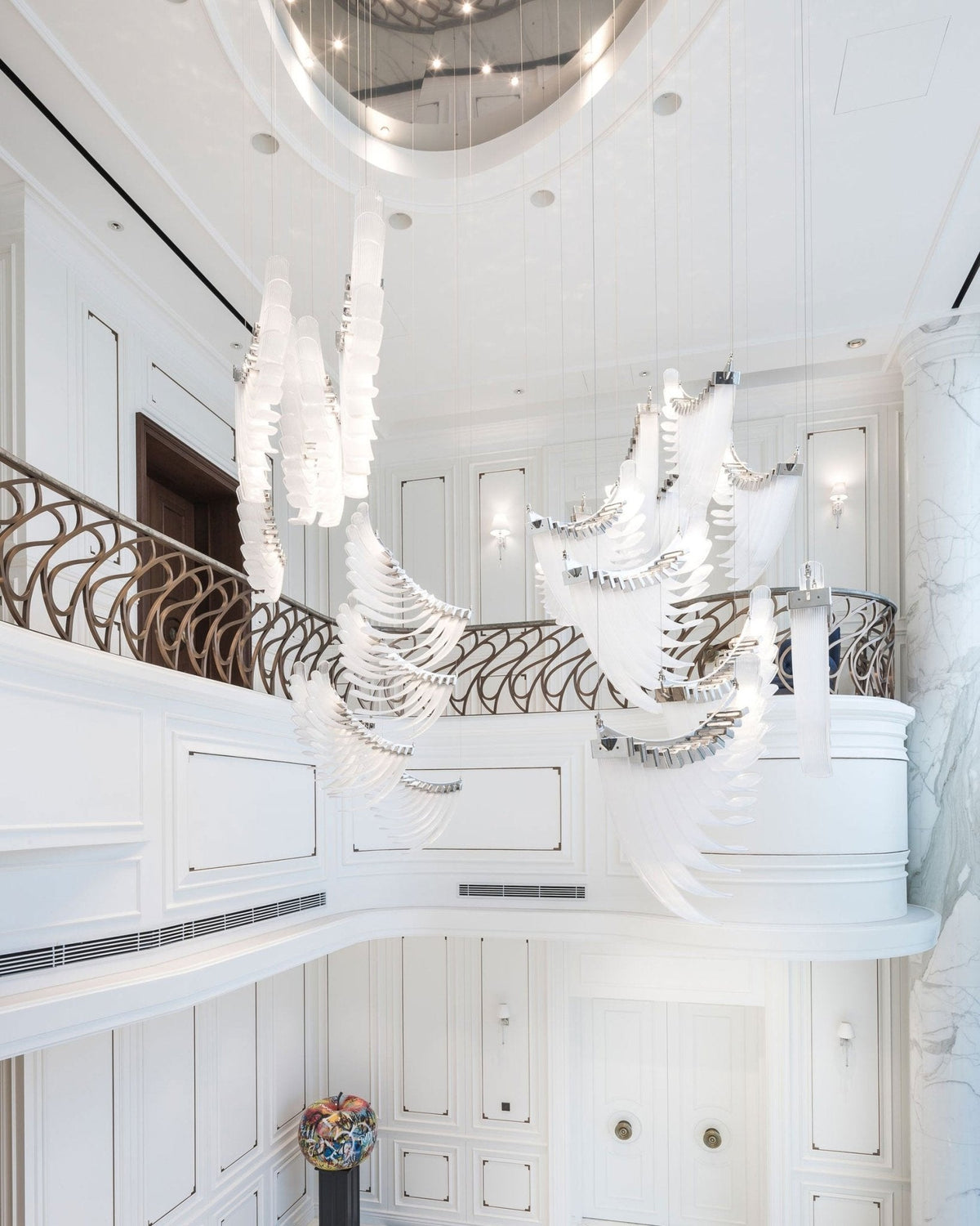 Pluma Sculptural Feather Chandelier – structural canopy joint detail