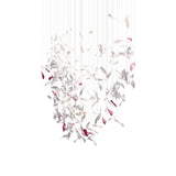 Pluma Sculptural Feather Chandelier – illuminated warm ambiance setting #1