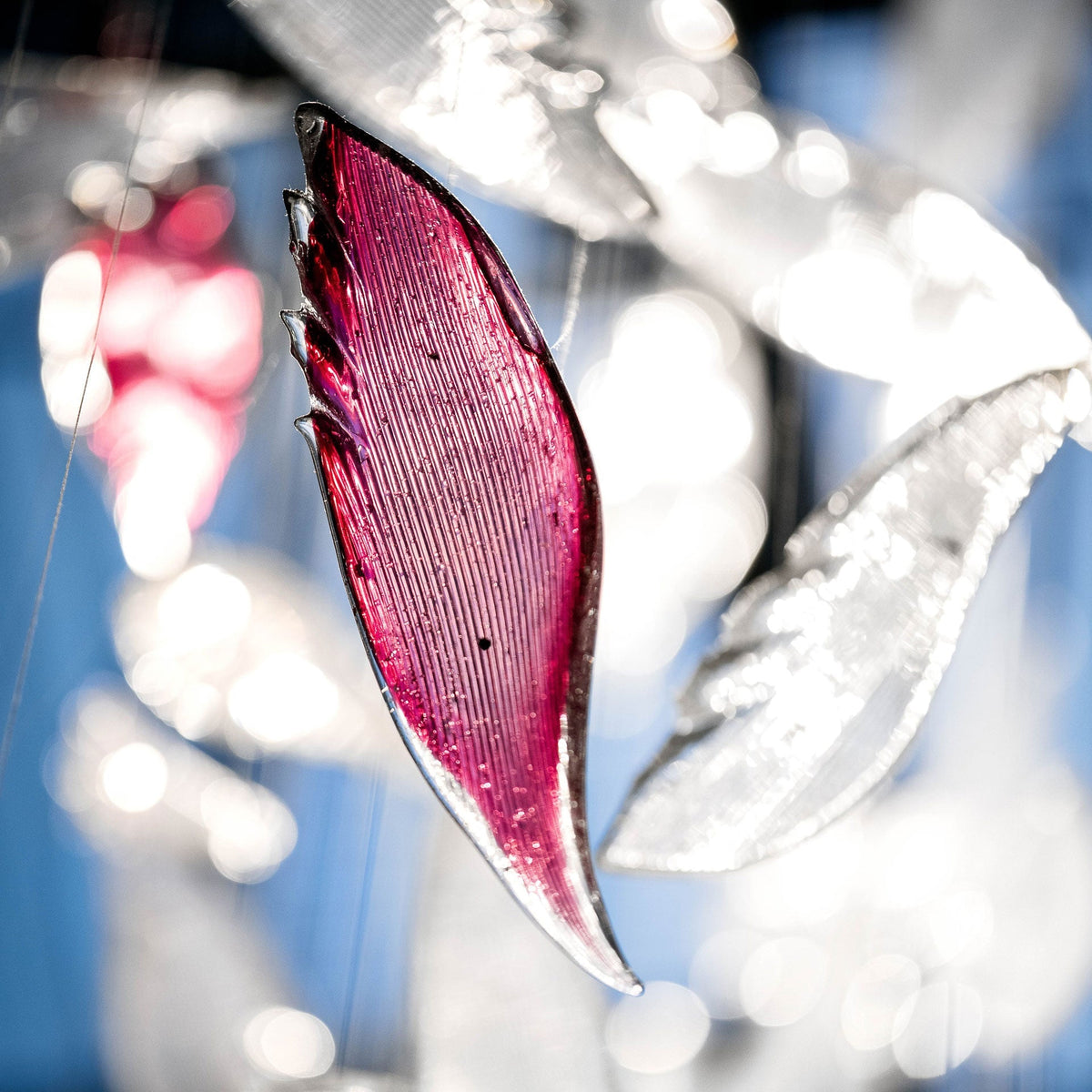 Pluma Sculptural Feather Chandelier – architectural ceiling profile