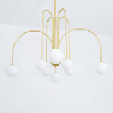 Delaney Curated Mouth-Blown Frosted Glass Chande – illuminated warm ambiance setting